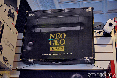 No, your eyes do not deceive you. That is in fact a boxed Neo Geo. $600 and she could be yours.