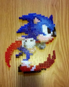 Sonic Immortalized mid-stride in beads.